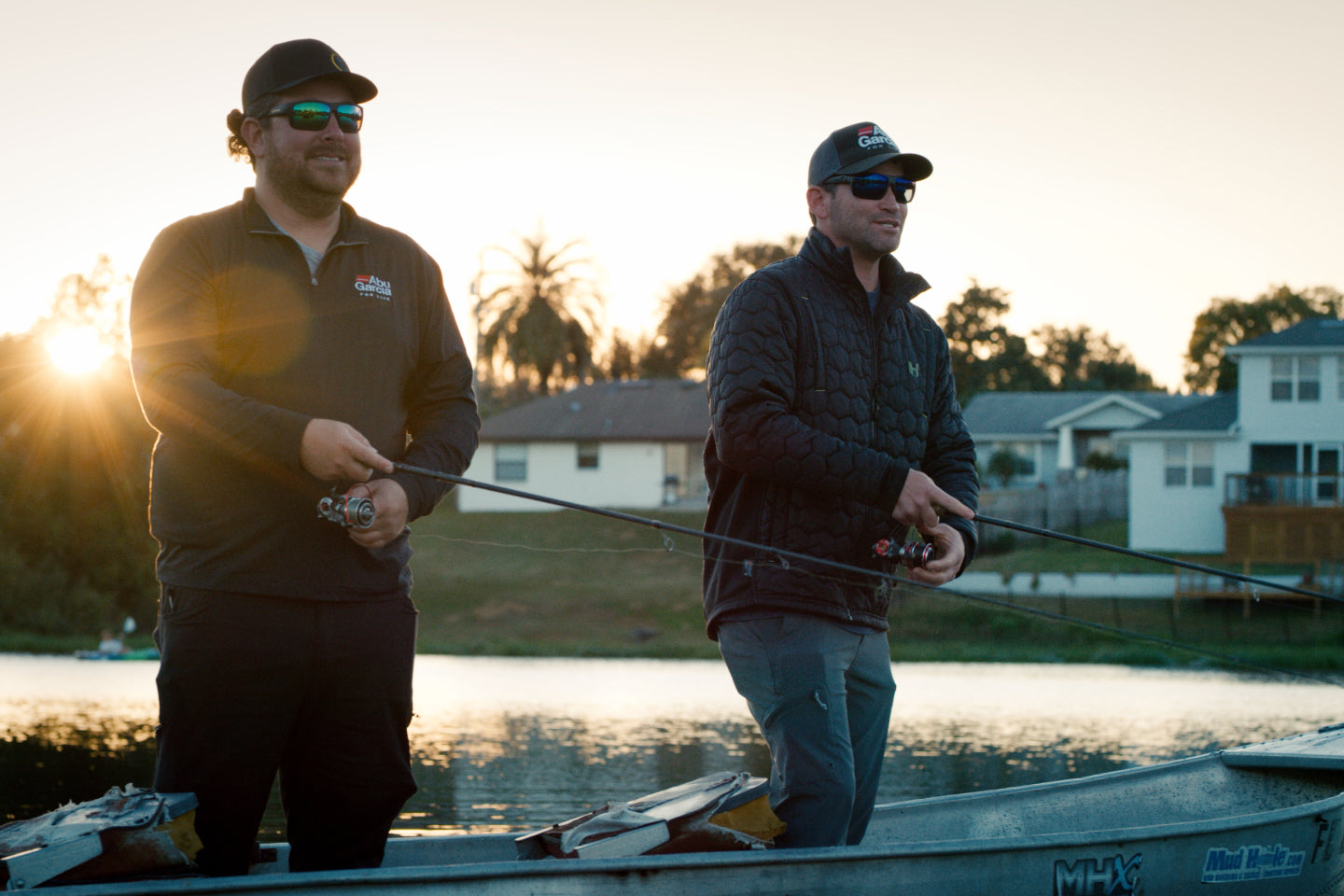 2 Men Smiling While Fishing