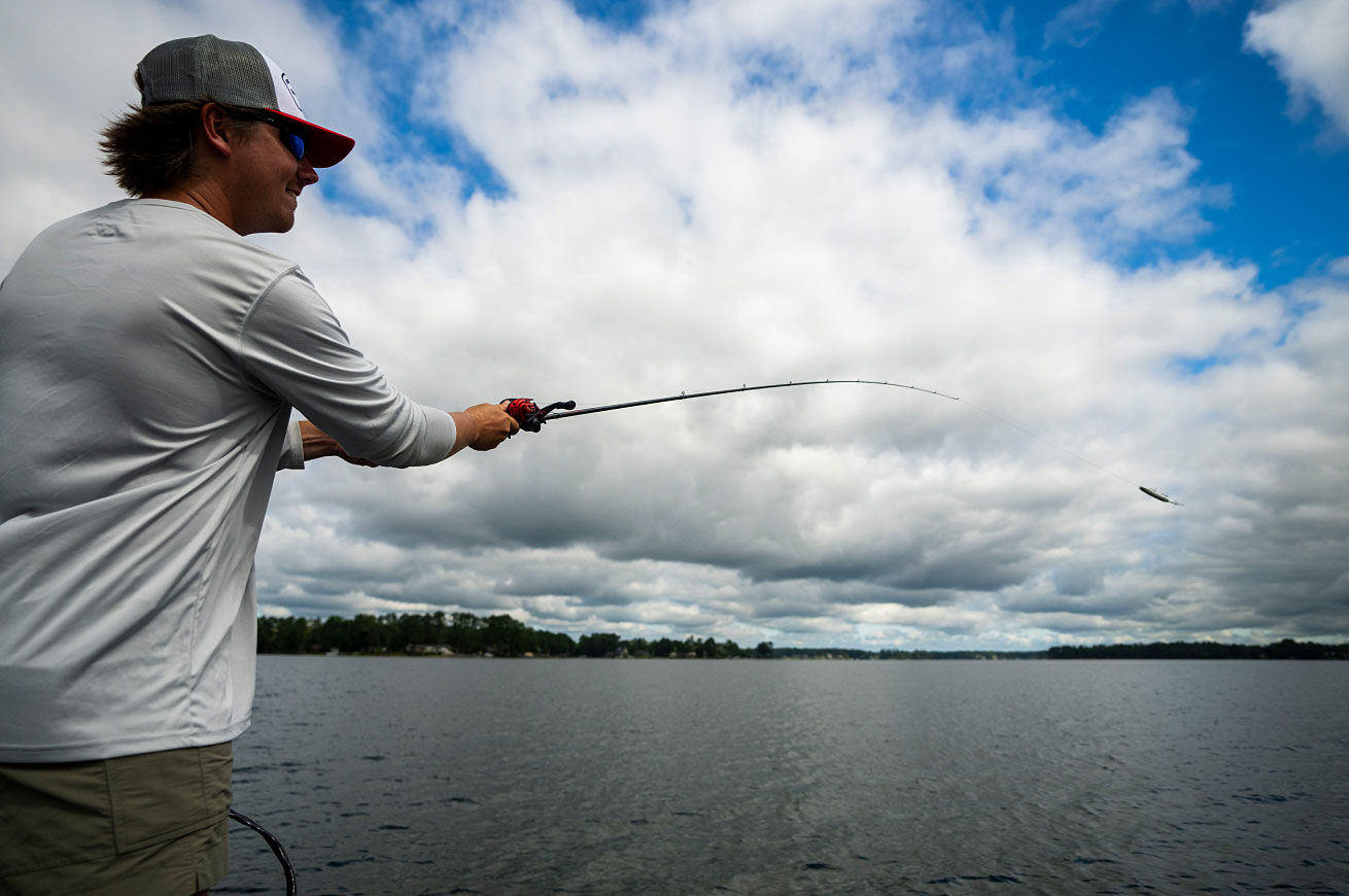 Man smiling while fishing